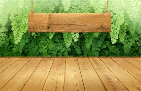 See table wood black background stock video clips. Wood table with hanging wooden sign on green leaves ...