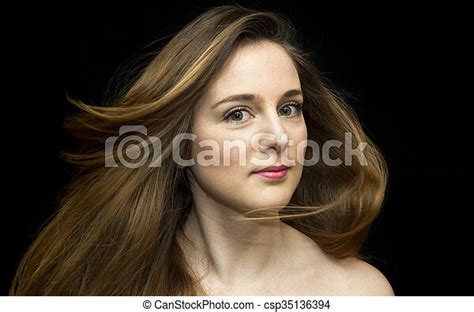 Beautiful Woman Shaking Her Hair Portrait Of Beautiful Young Woman Shaking Her Hair Over Black