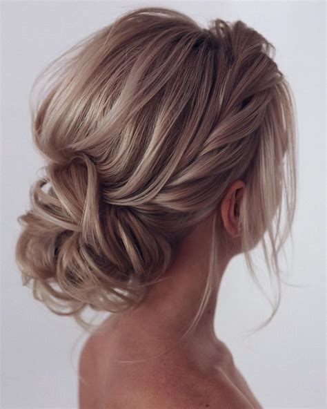 20 Classic Low Bun Wedding Hairstyles From Tonyastylist Roses And Rings