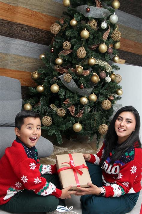 Divorced Single Mom And Son Latino Have Christmas Presents Sitting By