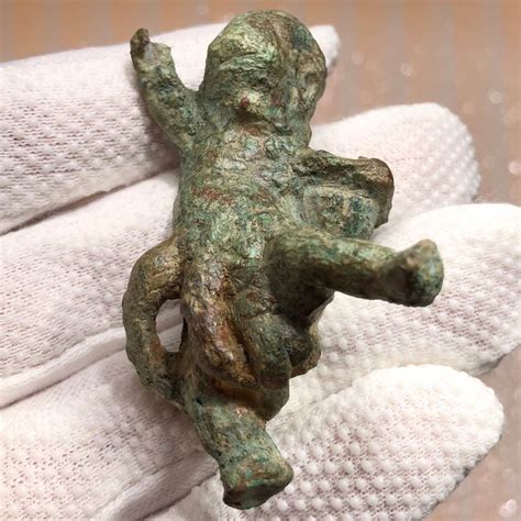 Ancient Roman Bronze Figurine Of A Naked Boy Wearing A Catawiki My