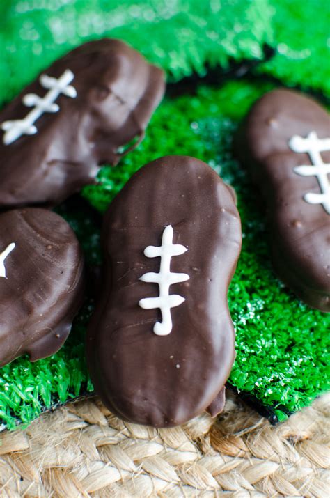 What could be cuter than these little nutters? football nutter butter decorated cookies - A Grande Life