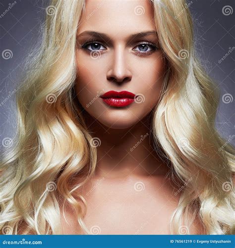 Luxury Beautiful Young Woman With Healthy Curl Blond Hair Stock Image