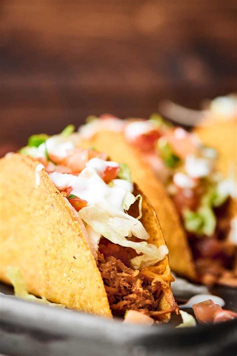 When cool enough to handle, shred meat with 2 forks; Crockpot Mexican Chicken Recipe - Healthy, Gluten Free ...