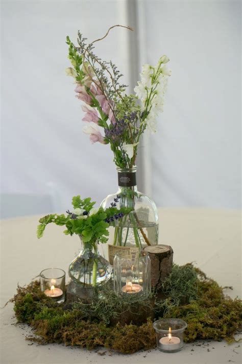 Ways To Use Moss In Your Spring Decor Moss Centerpiece Wedding