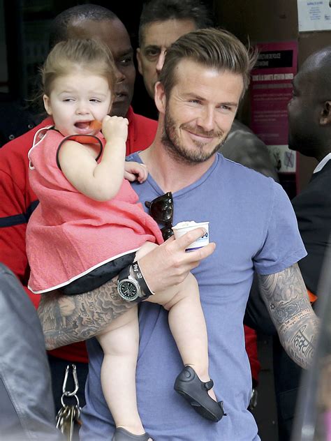 David Beckham Held On To His Daughter Harper Beckham In Paris Mays