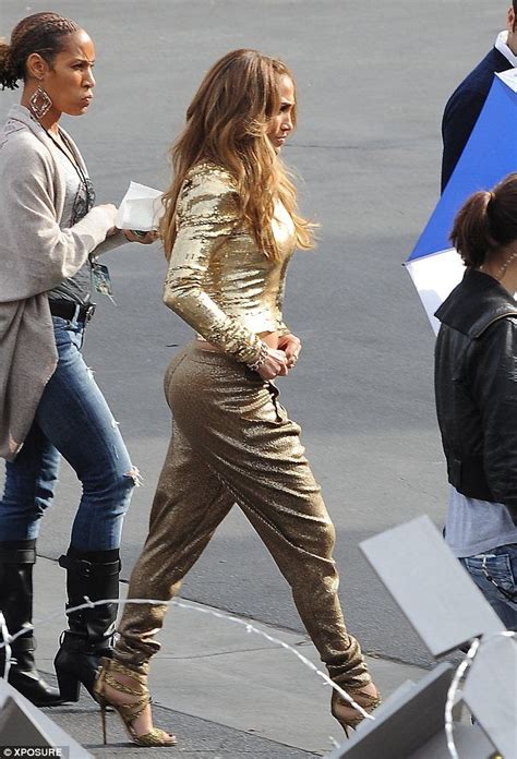 All That Glitters Is Gold Jennifer Lopez Flaunts Her Toned Tummy In A
