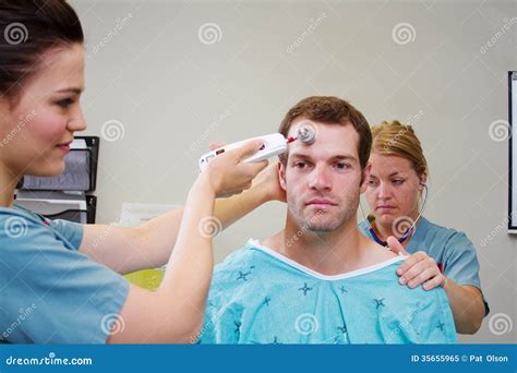 Nurses Assessing Patient Stock Image Image Of Hospital 35655965