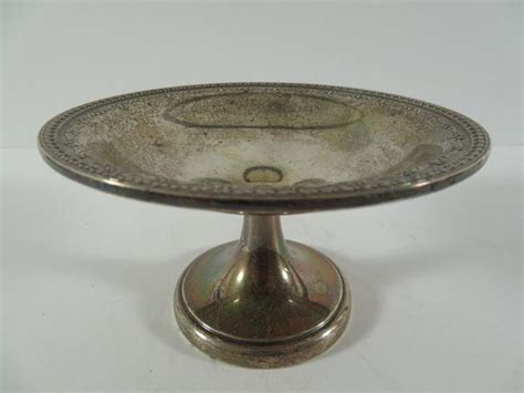 I cleaned them up and they turned out rather nice. Sterling Silver Hallmarked Weighted Candy Dish