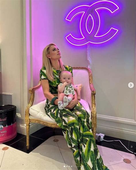 Paris Hilton Is A Very Proud Mother As She Cradles Son Phoenix In Stylish Photos At Home