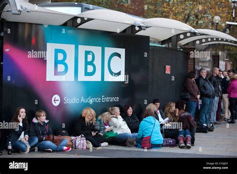 People queuing outside BBC British Broadcasting Corporation, Wood Stock ...