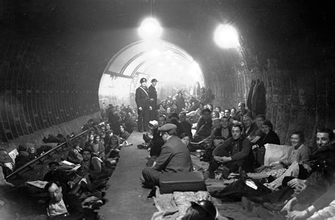 Photo Londoners Taking Shelter In An Underground Train Tunnel During