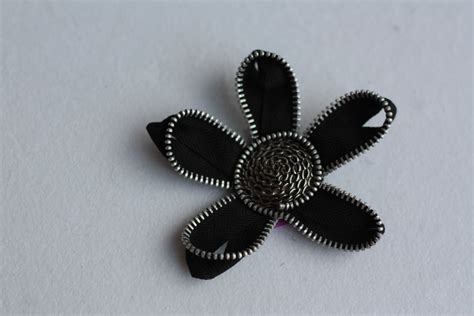 Black Zip Flower Brooch With Chunky Metal Button By Amitié Crafts