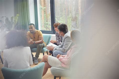People Listening To Man In Group Therapy Session Stock Image F020 6584 Science Photo Library