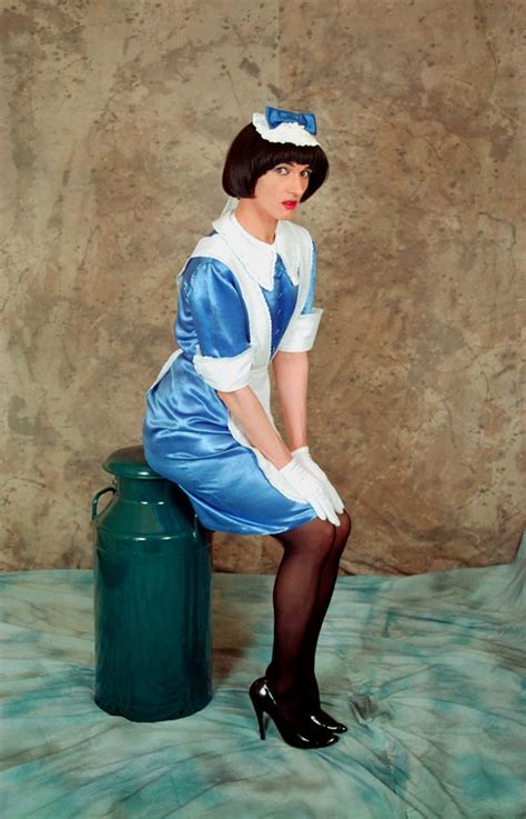 a photo of me in my bespoke blue satin maid uniform which sadly didn t stand the test of time