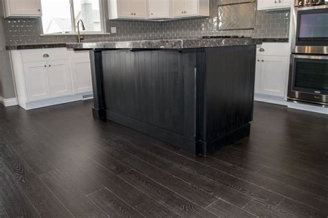 Learn all about cabinets door styles and drawers with our 101 guide and choose discount kitchen cabinets in nj! Black island with beautiful countertop | Custom built ...