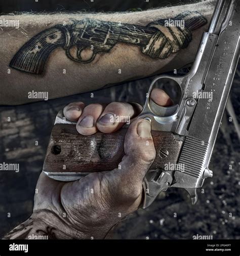 South African Gangster With Tatoo And 9mm Star Hand Gun Stock Photo Alamy