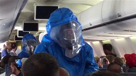 Man Escorted Off Plane By Men In Hazmat Suits After Ebola Scare On Us
