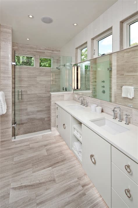 Black & white accent walls. Gray and White Modern Spa Bathroom With Walk-In Shower | HGTV