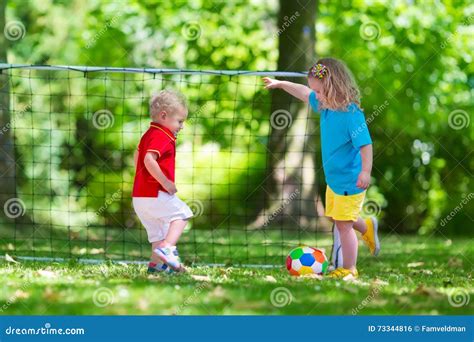 Kids Playing Football In School Yard Stock Photo Image Of Activity
