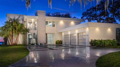 Modern asian architecture house design the simplest moment modern asian architecture house modern black and white house design dramatic interior modern black and white house design. Modern White Beach House Features Polished Driveway | HGTV