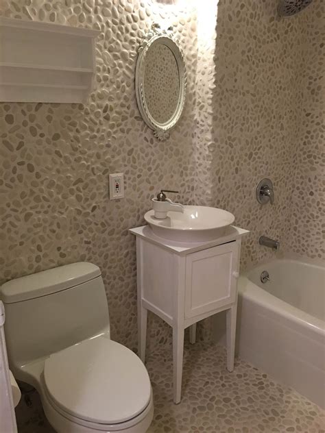 White Pebble Tile Bathroom Floor And Walls Guest Bathrooms Bathroom