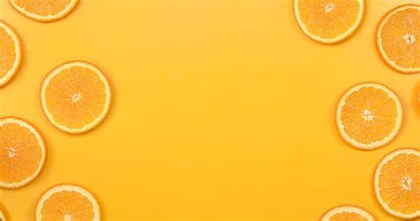 Premium Photo Orange Fruit On An Orange Background