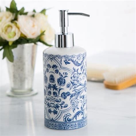 The most common white bath accessories material is metal. A blue and white porcelain dispenser to make any lotion ...