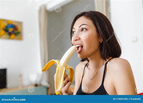 Eating Banana In Her Apartment Stock Image Image Of House Female 174041305