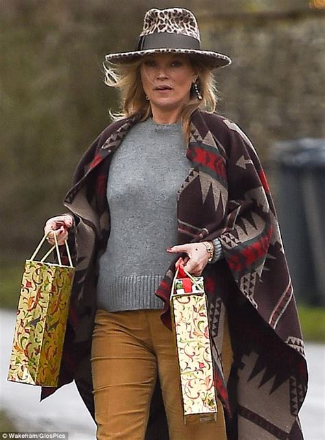Boho Kate Moss Delivers Festive Ts To Her Neighbours Daily Mail Online