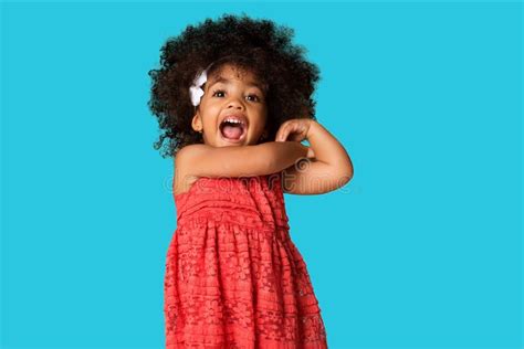 Childhood And People Concept Cheerful African American Little Girl Over