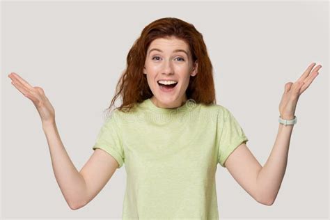 Excited Happy Redhead Woman Raise Palms Posing On Grey Background Stock Image Image Of