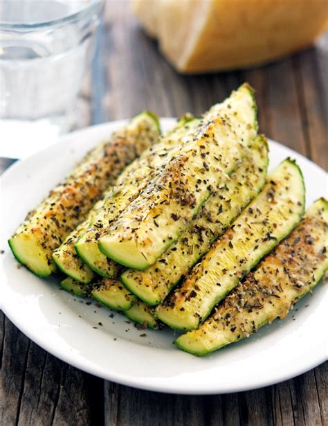 Drizzle olive oil in a baking sheet and set aside. The Iron You: Easy Baked Parmesan Zucchini