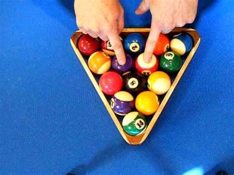 To rack tightly, rack the balls and place your thumb inside of the racking so that there will be no space between balls. how to rack 8 ball billiards - YouTube