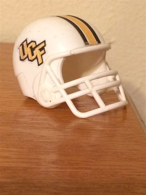 This is the helmet of garo the golden knight from the japanese television series/anime garo. Central Florida Golden Knights | Football helmets, Helmet ...