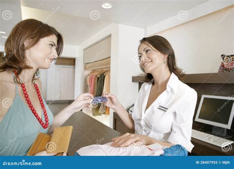 Woman Making Payment By Counter Stock Image Image Of Attendant Desk