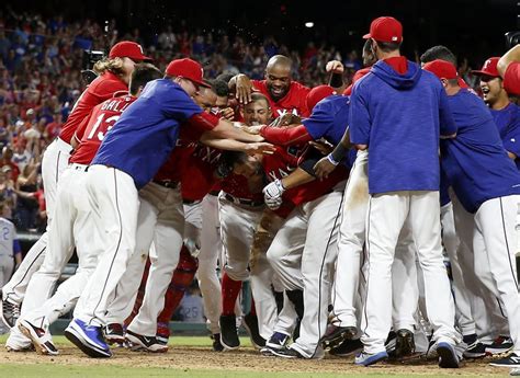 Texas Rangers First Baseman Mitch Moreland 18 Is Congratulated By