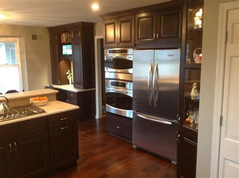 Stainless steel cabinets for kitchens, garages, bathrooms and commercial use. Walnut Cabinets with Stainless steel appliances ...