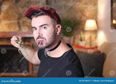 Man With Forked Tongue Holding Snakes Stock Image Image Of Mouth
