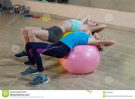 Two Women Exercising On Exercise Ball Stock Image Image Of Routine