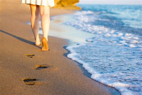 Close Up Of Footprints In The Sand At Sunset Stock Image Image Of