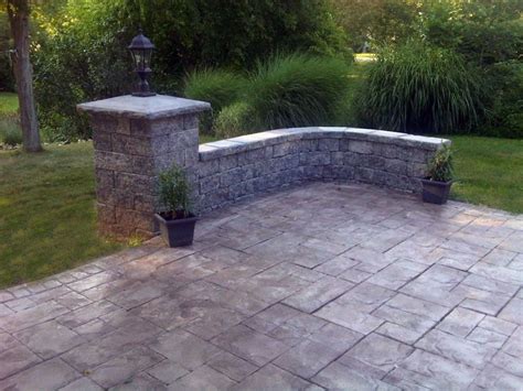 Ashlar Slate Pattern On A Stamped Concrete Patio With Pavers Sitting