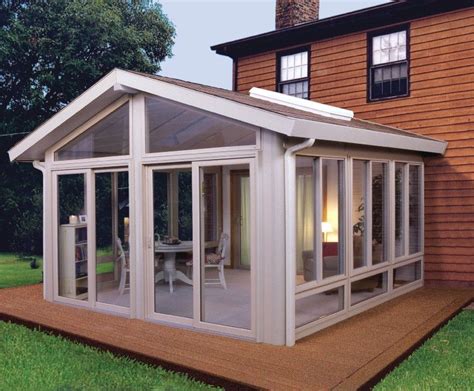 Additional patio enclosure types and costs. I like all the windows. Would be great to feel like you're ...