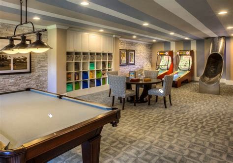 Neutral basement features a sectional and wood accents. 72 Really Cool Modern Basement Ideas | Luxury Home ...