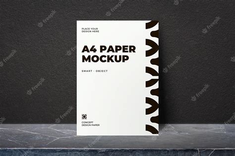Premium Psd A4 Paper Mockup With Leaning Effect