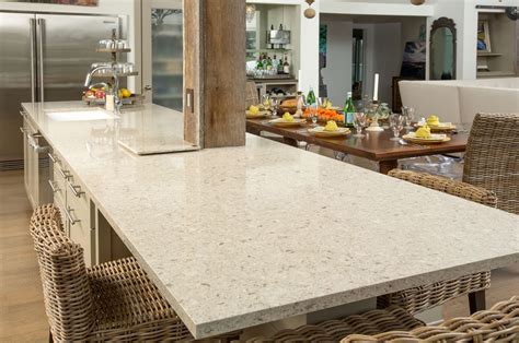 Continuing the granite of the countertop up into the backsplash of the corner makes for a striking visual against the cabinets and better showcases the gorgeous patterning in the granite. Are White Granite Kitchen Countertops a Design Trend in 2019?
