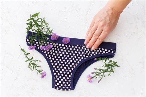 Woman S Hand With Beautiful Panties On White Background Stock Photo