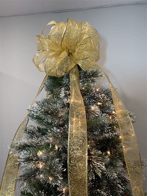 Large Christmas Tree Topper Bow Made With A Sheer Gold Ribbon With Gold