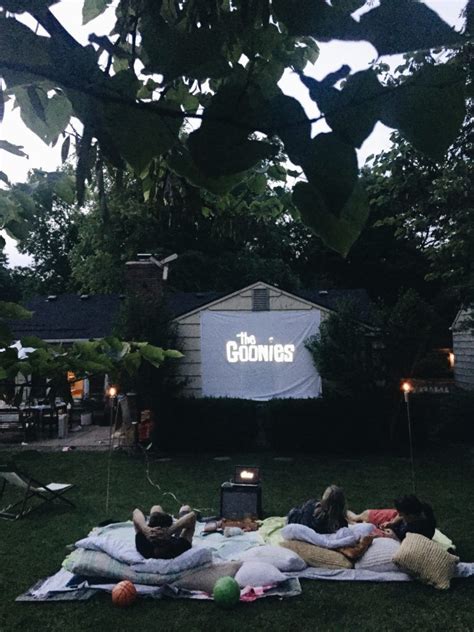How To Host A Backyard Movie Night Bev Cooks Backyard Movie Nights