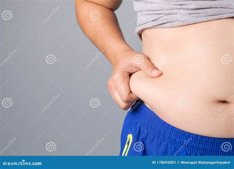 Woman Pinching Fat Belly Stock Photos Free Royalty Free Stock Photos From Dreamstime